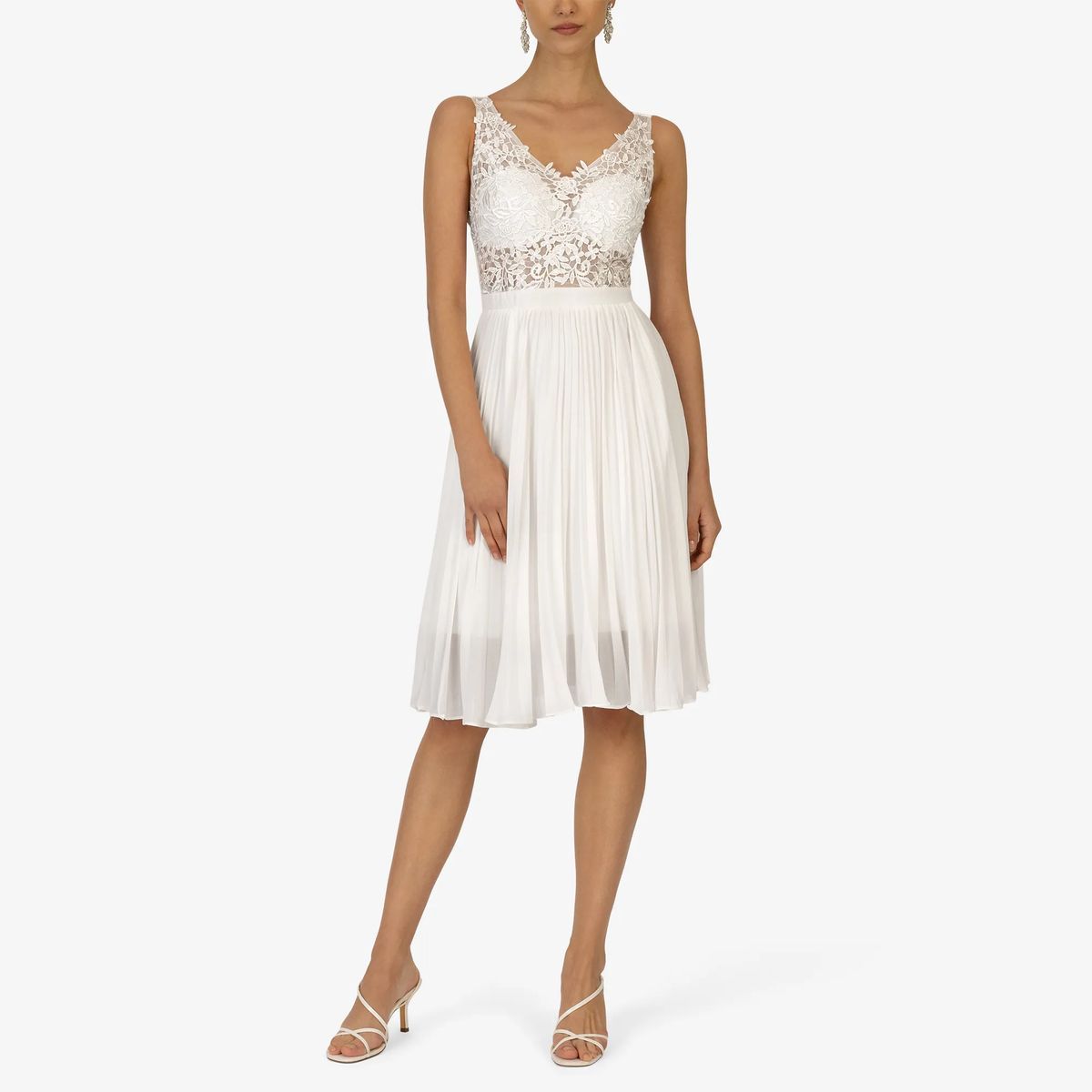 Elegantes Kleid mit Spitze und Faltenrock