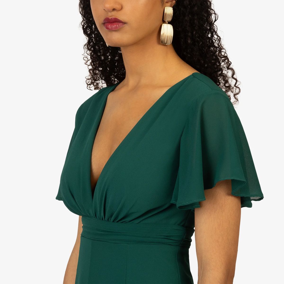 Eleganter grüner Jumpsuit mit V-Ausschnitt