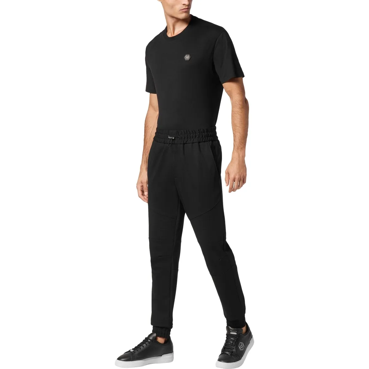 Modernistische, schmal geschnittene schwarze Jogginghose