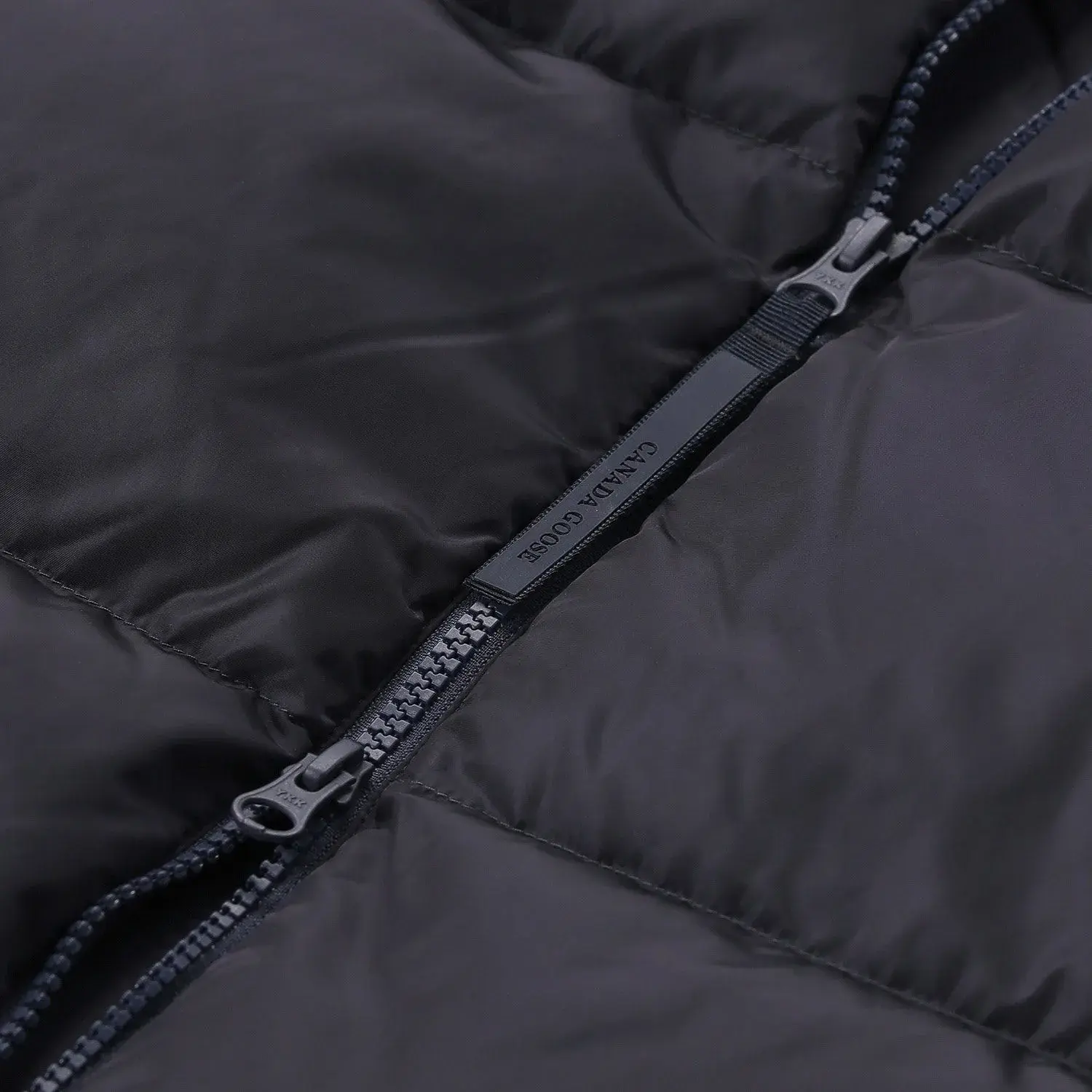 Hybrid Daunenjacke mit Strickärmeln