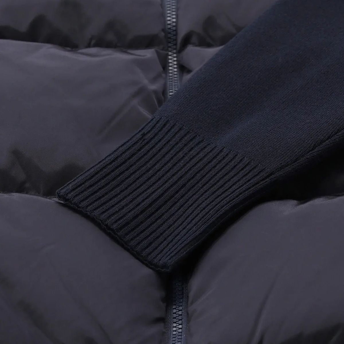 Hybrid Daunenjacke mit Strickärmeln