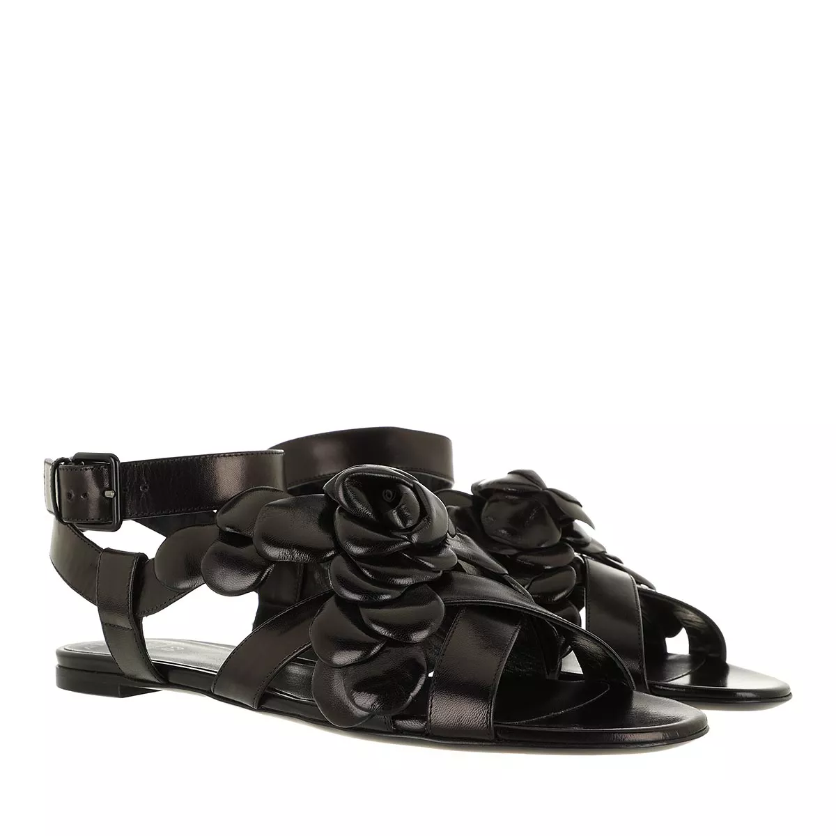 Schwarze Ledersandalen mit Rosenapplikationen