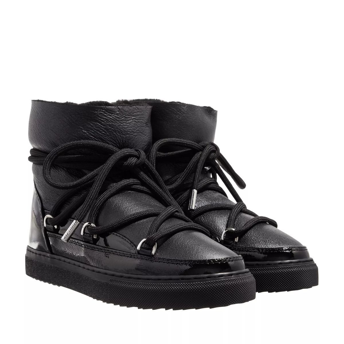 Schwarze, glänzende Winterstiefel aus Leder