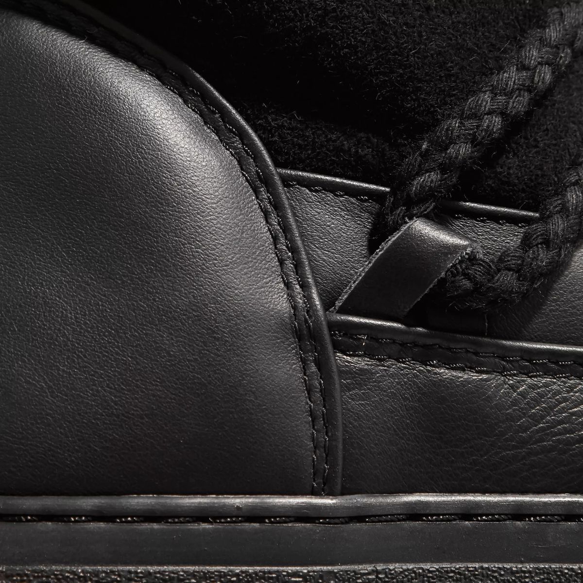 Schwarze Shearling-gefütterte Stiefeletten
