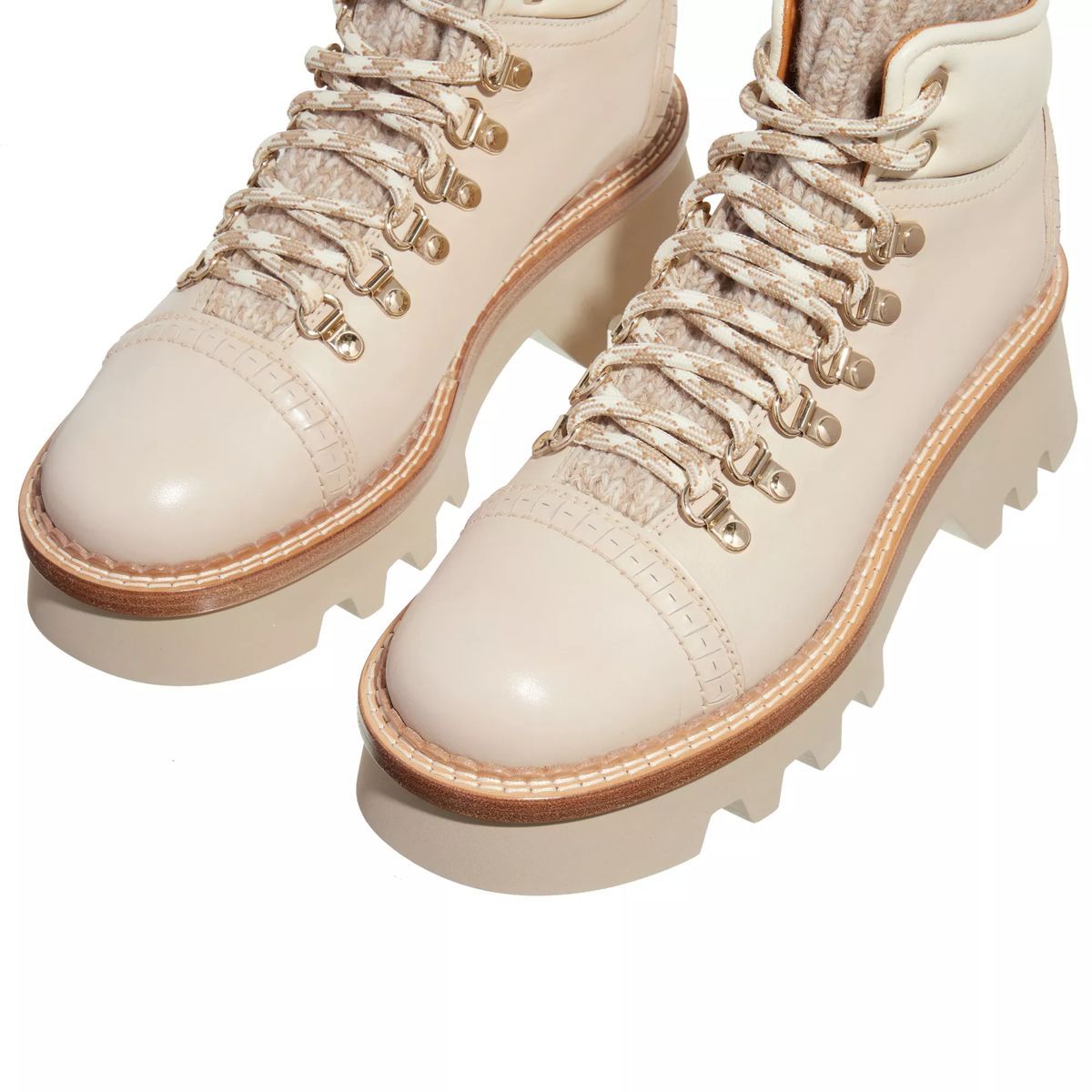 Cremefarbene Leder-Stiefeletten mit Strickbund
