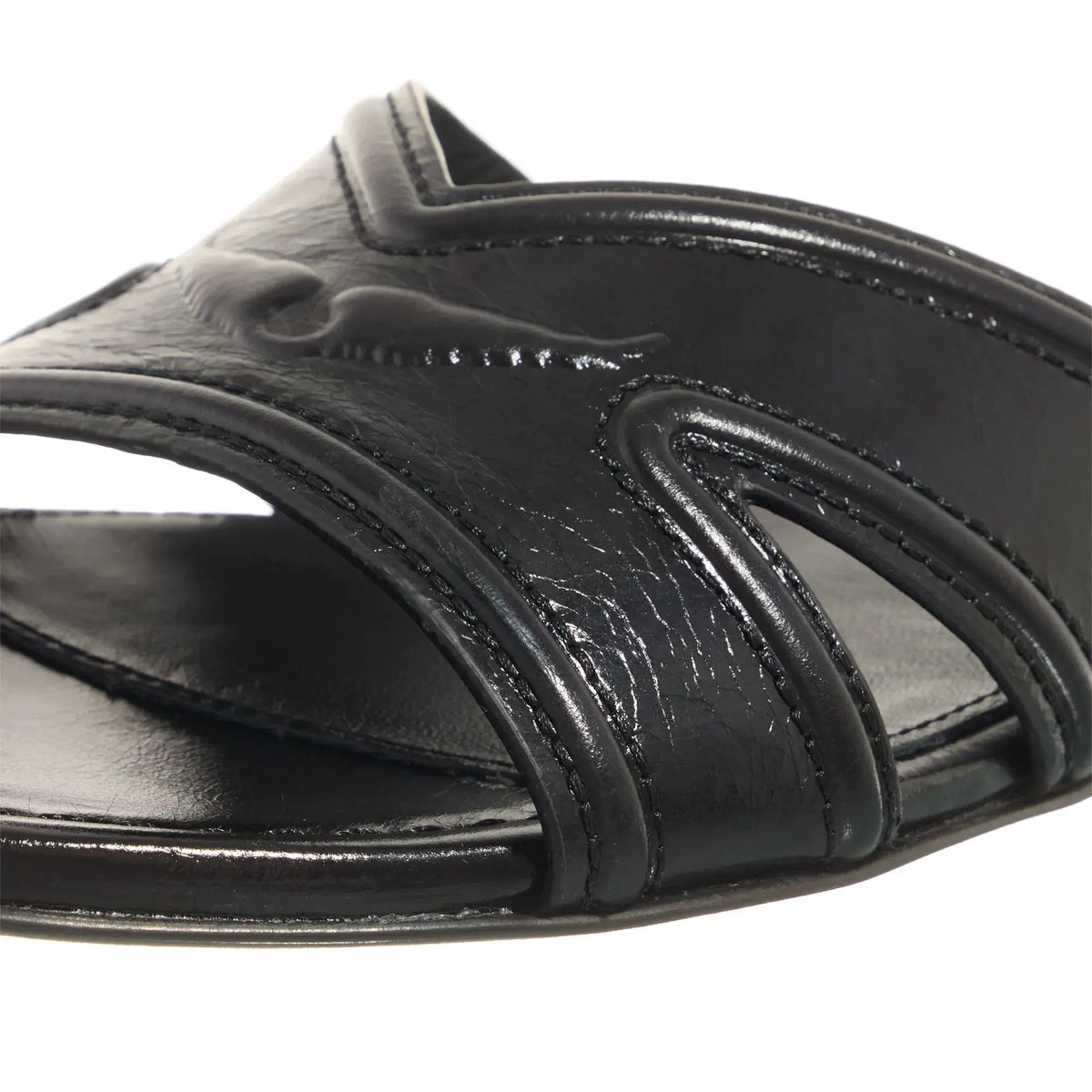 Elegante Pantoletten aus schwarzem Lackleder