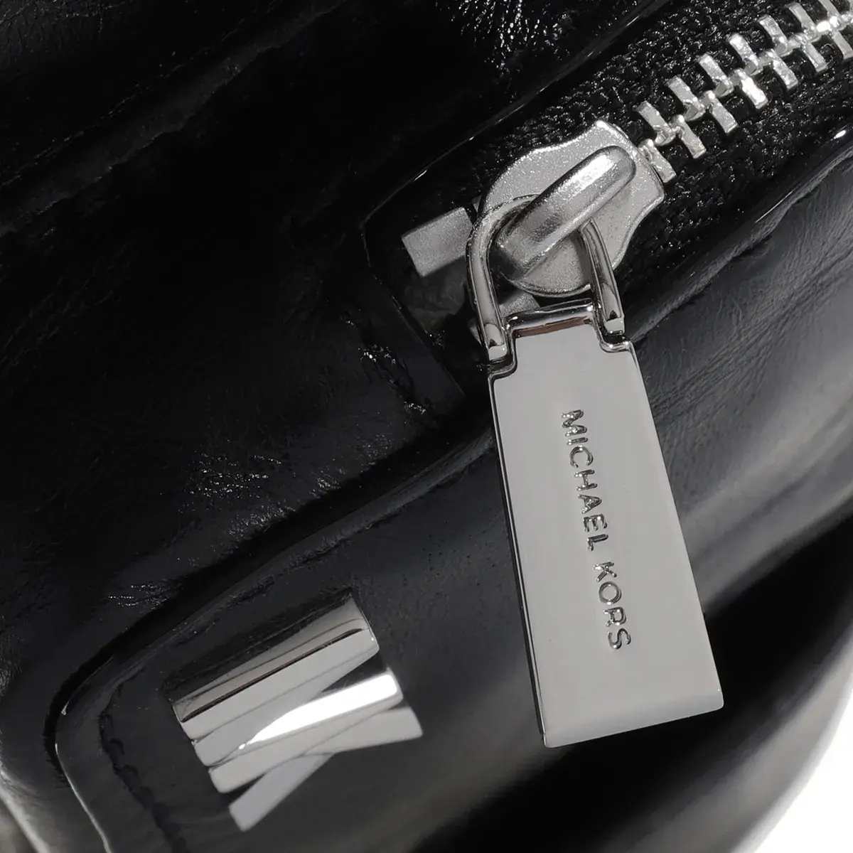Kompakte Leder-Umhängetasche mit Taschen