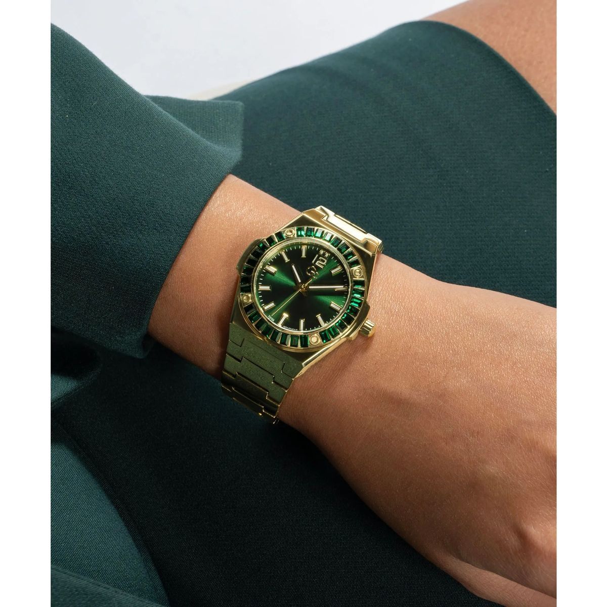 Elegante grün-goldene Uhr