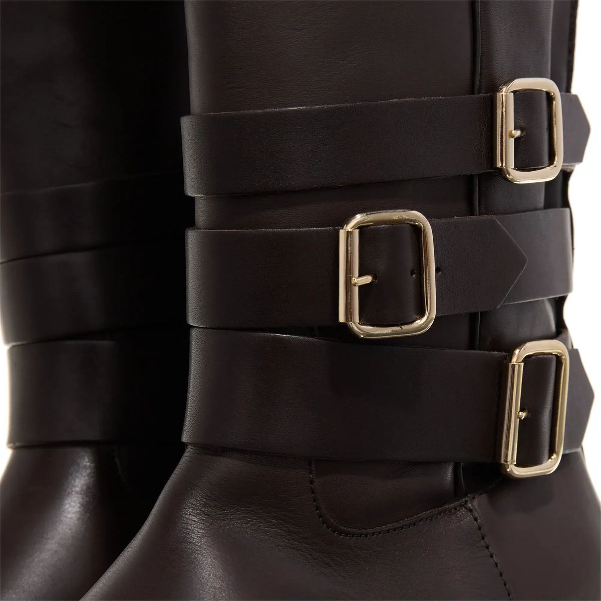 Lederhohe Stiefel mit Schnallen