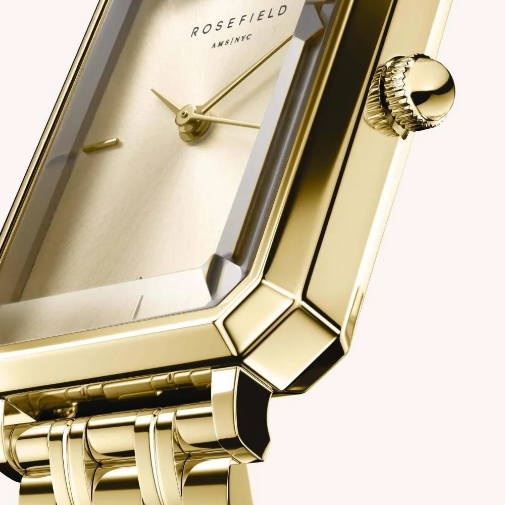 Elegante goldfarbene, rechteckige Uhr