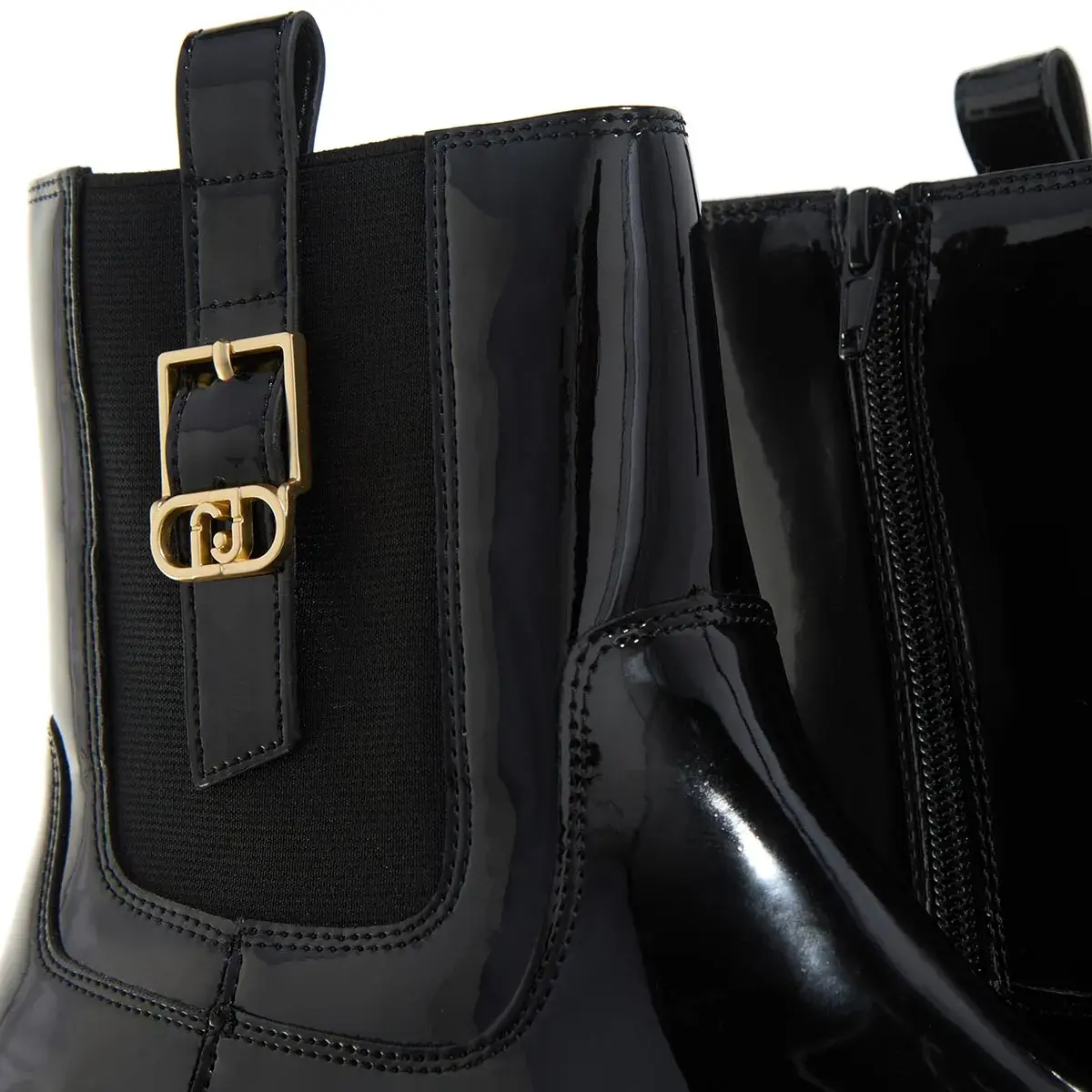 Schwarze Plateaustiefel aus Lackleder