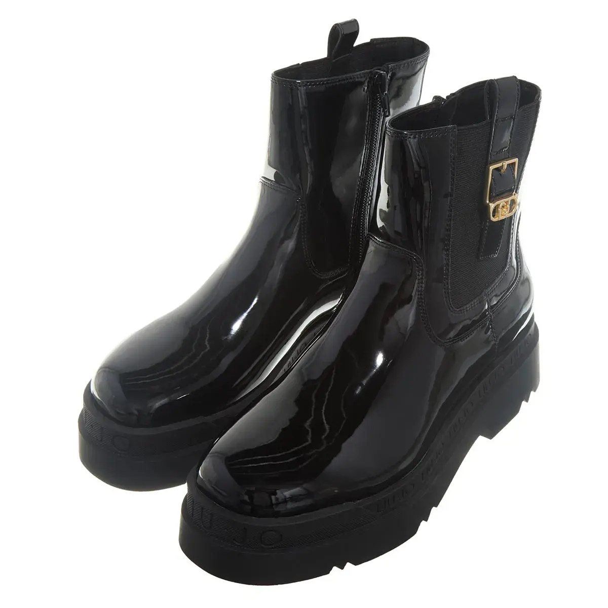 Schwarze Plateaustiefel aus Lackleder