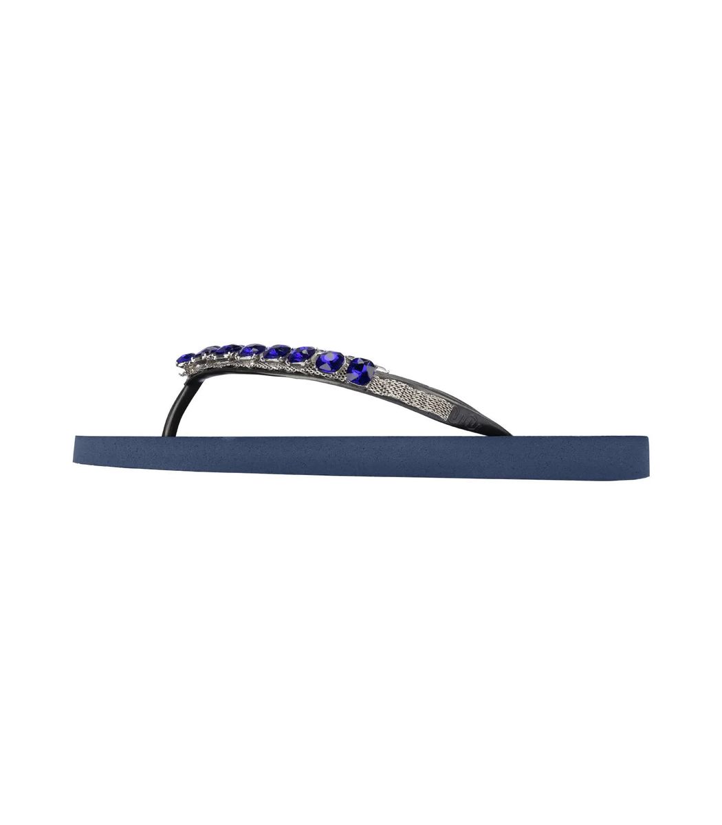 Blaue juwelenbesetzte Flip-Flops
