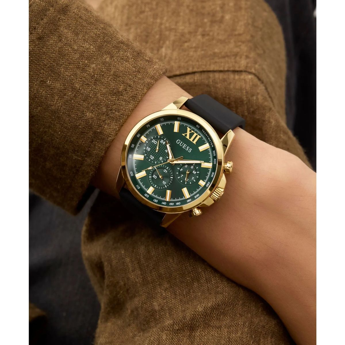 Goldfarbene grüne Chronographenuhr