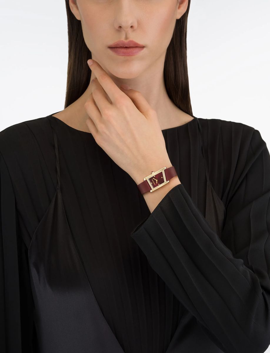 Asymmetrische, goldfarbene, burgunderrote Uhr