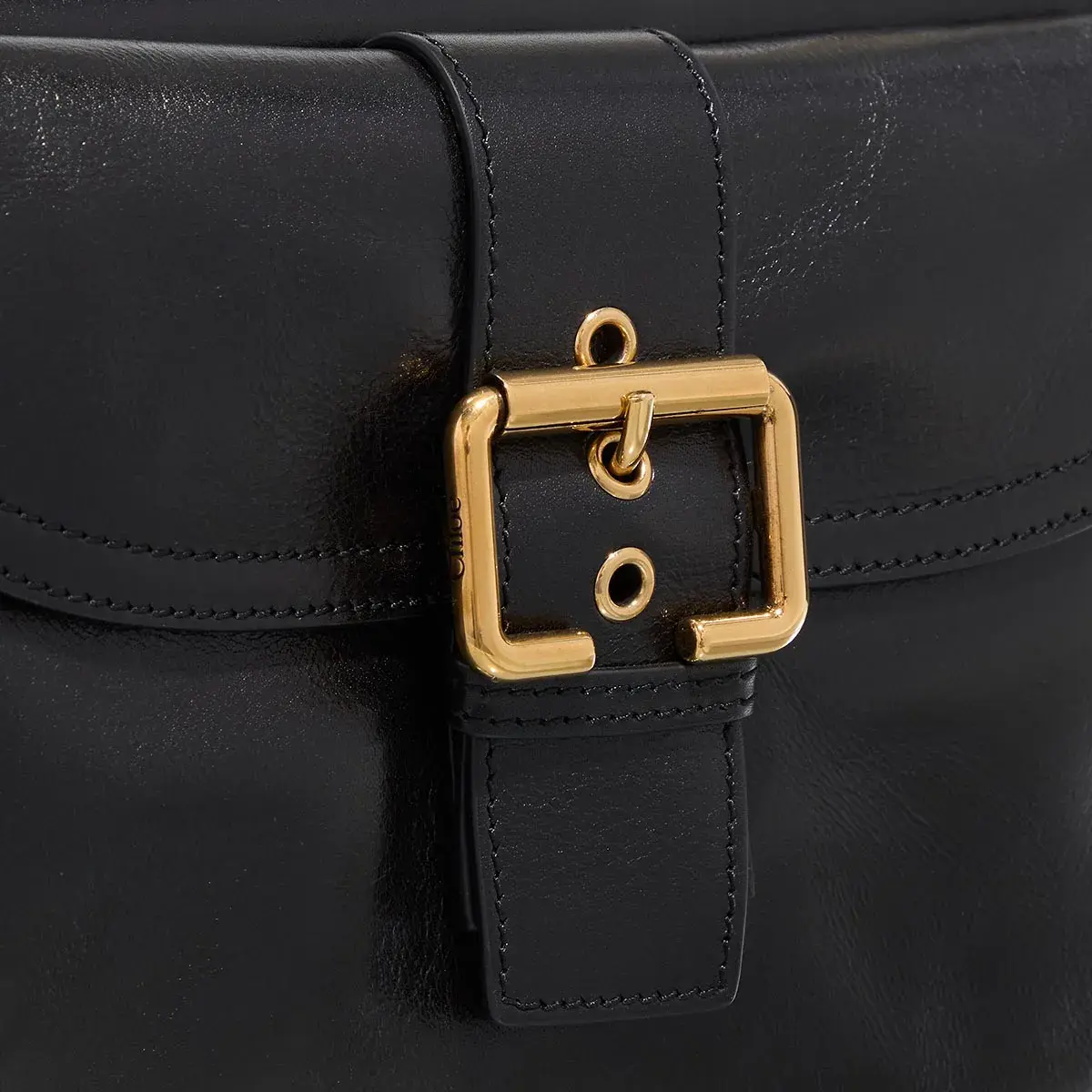 Schwarze Ledertasche mit Taschen