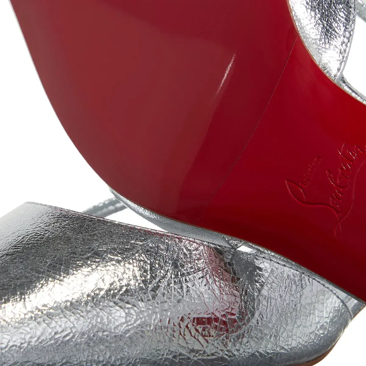 Silberne Slingback Pumps mit spitzer Zehe