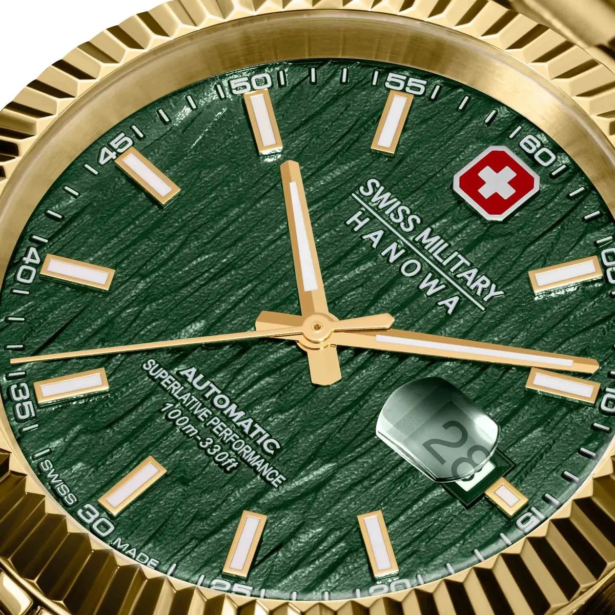Goldene Automatikuhr mit grünem Zifferblatt