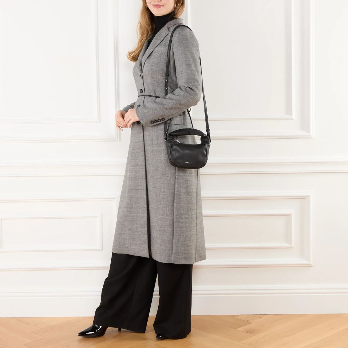 Schwarze Leder Schultertasche Hobo-Stil