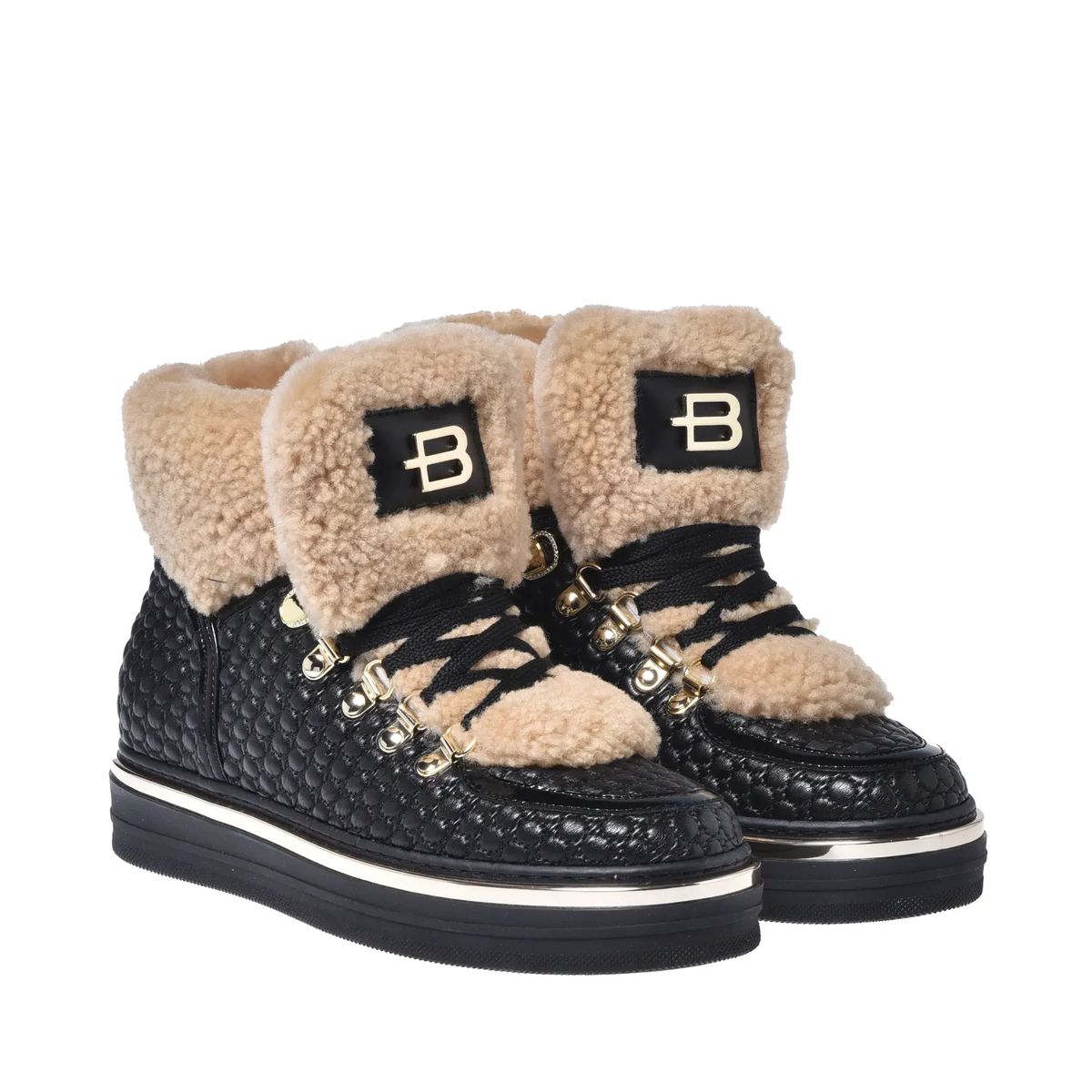 Sneakers aus gestepptem Leder mit Shearling-Akzent