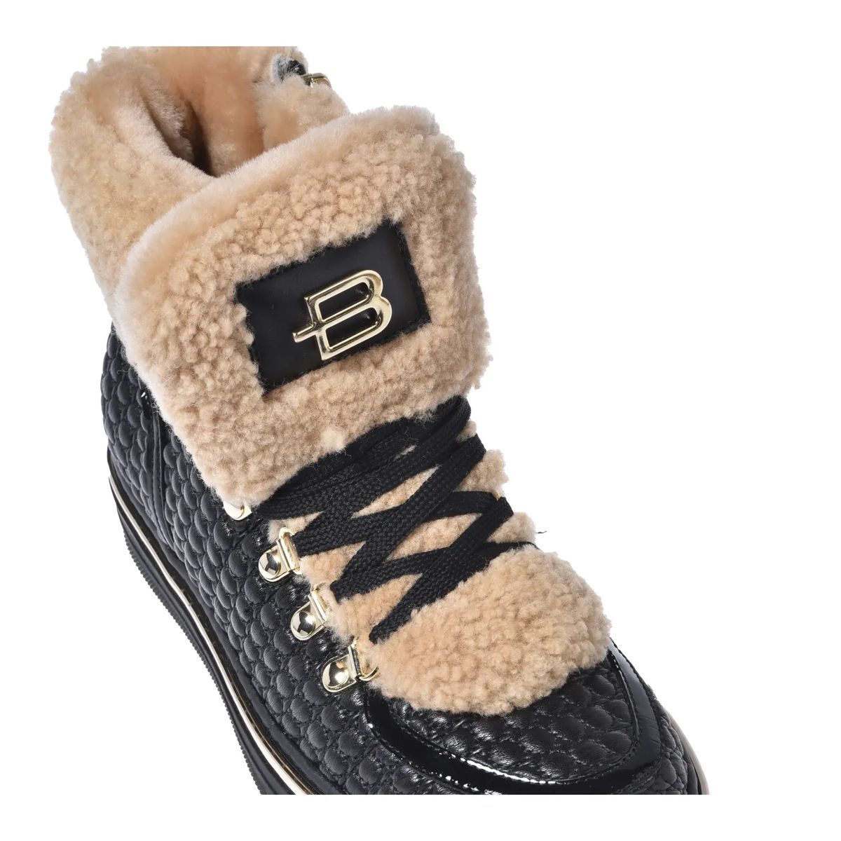Sneakers aus gestepptem Leder mit Shearling-Akzent