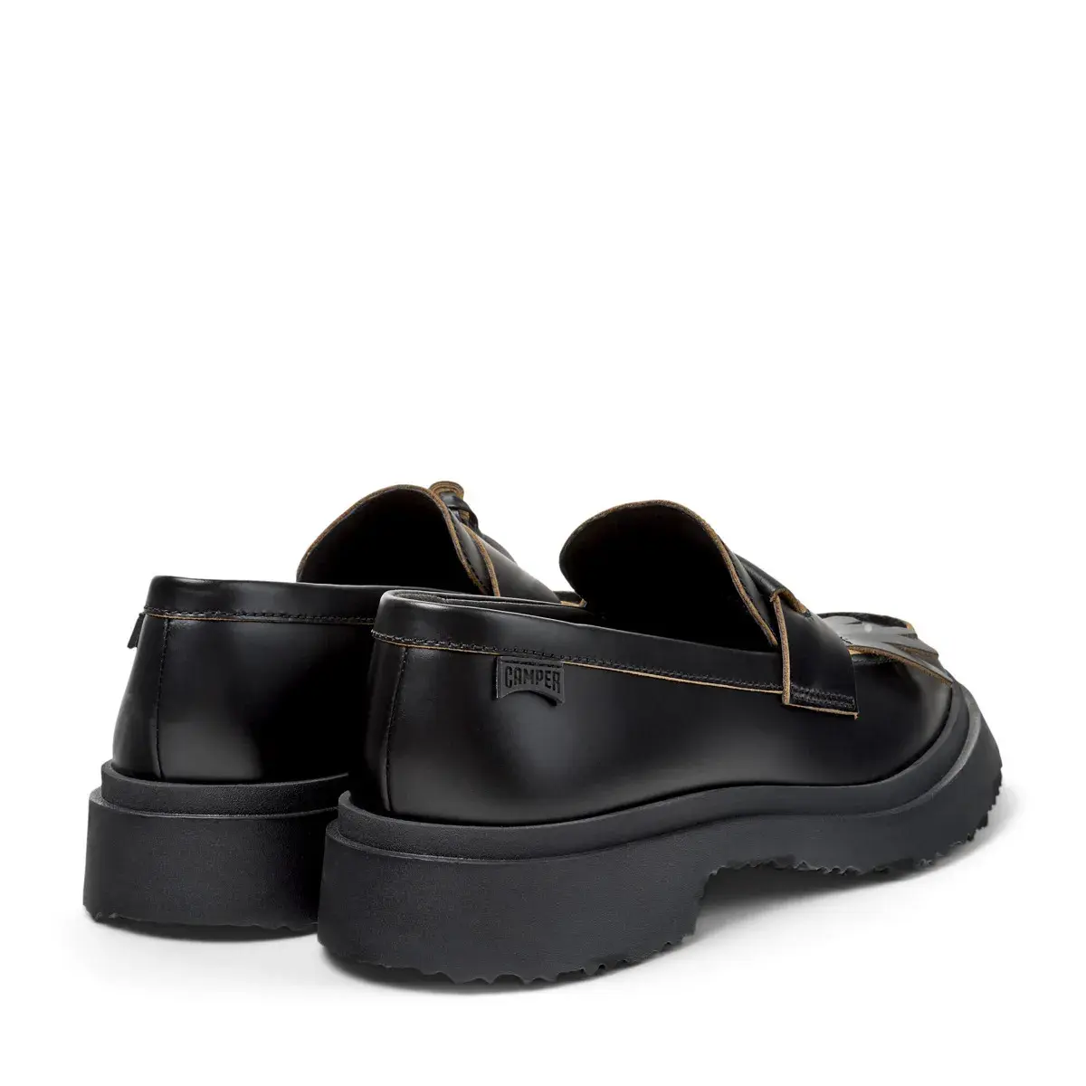 Schwarze Leder Slipper mit Quasten Plateausohle