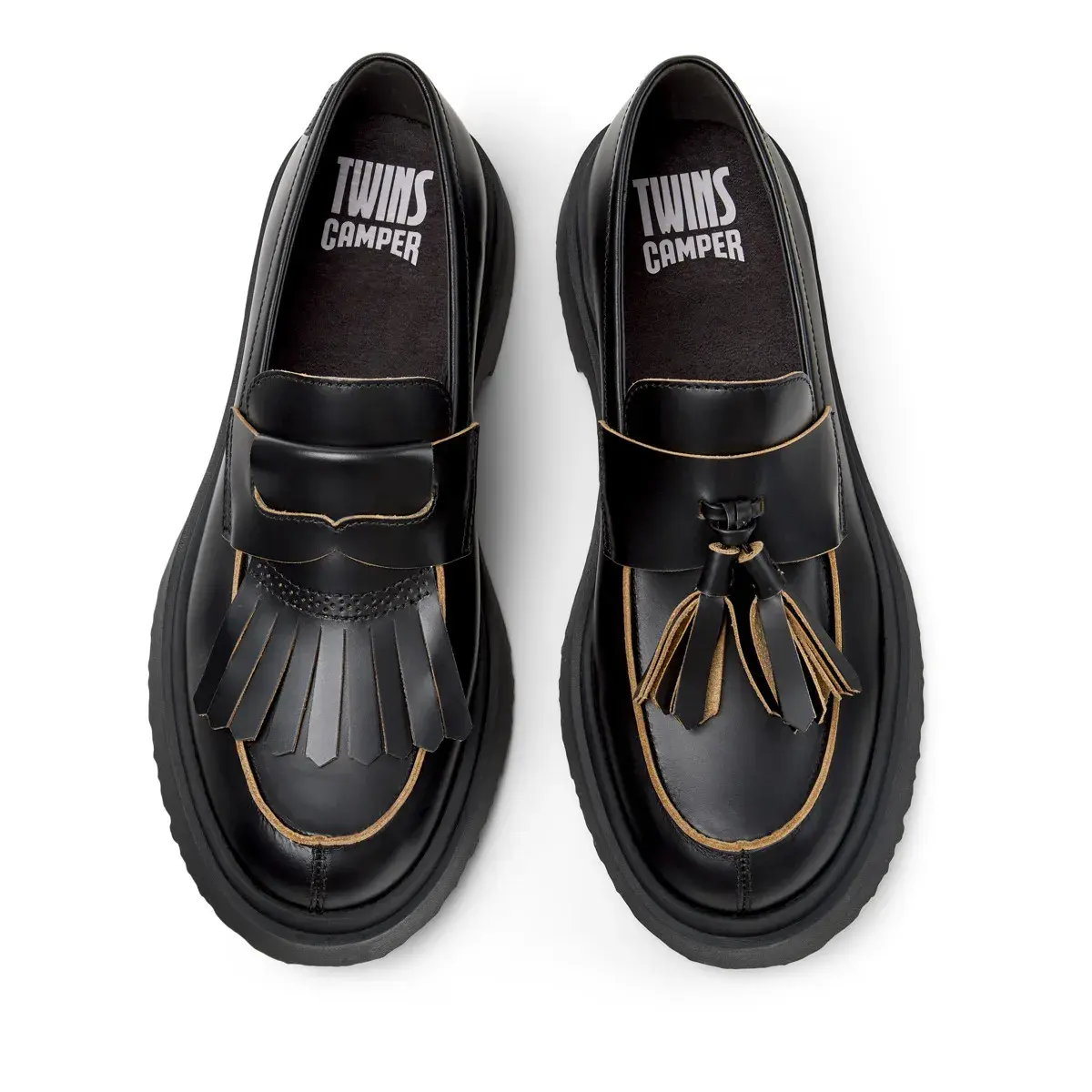 Schwarze Leder Slipper mit Quasten Plateausohle