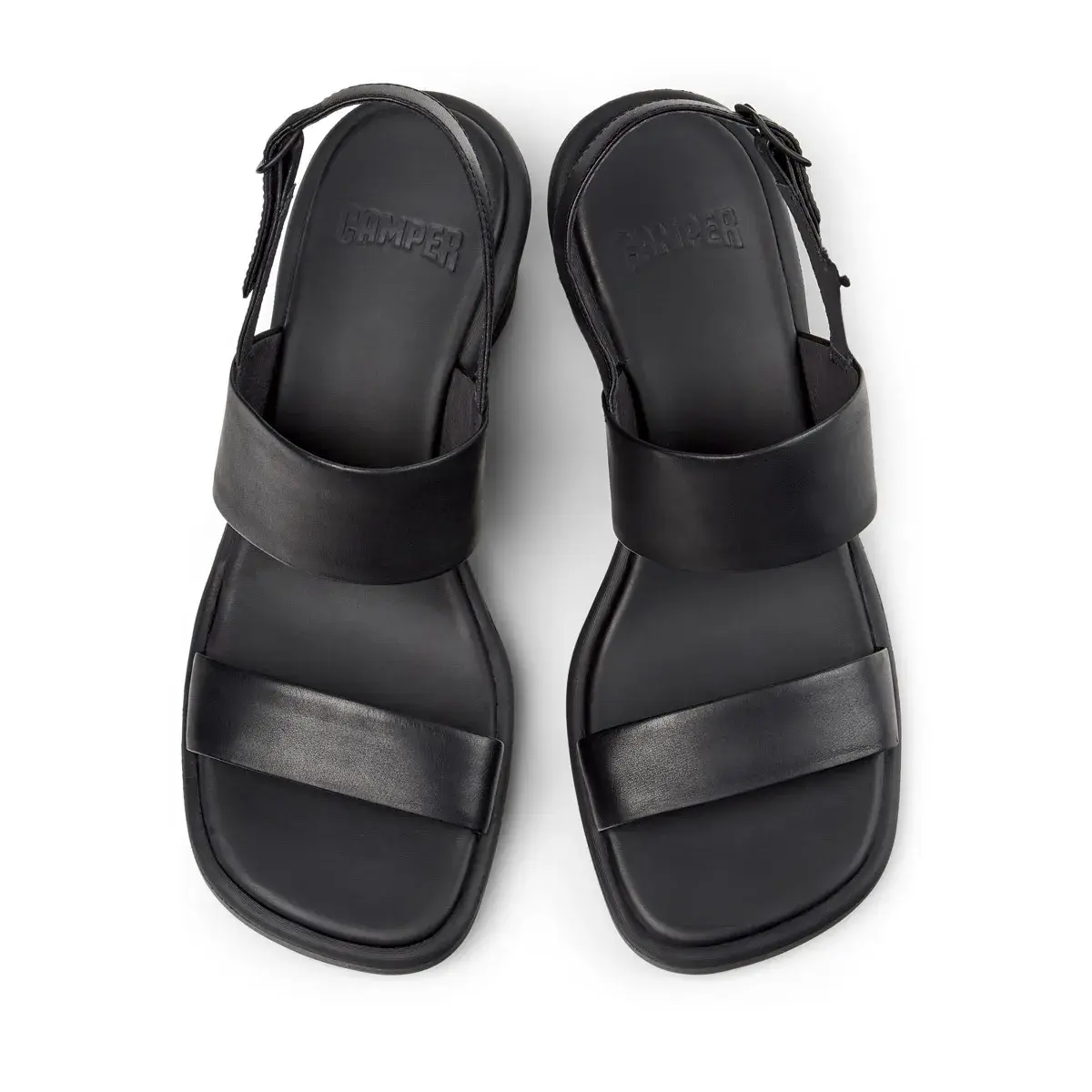 Moderne schwarze Leder Keilsandalen
