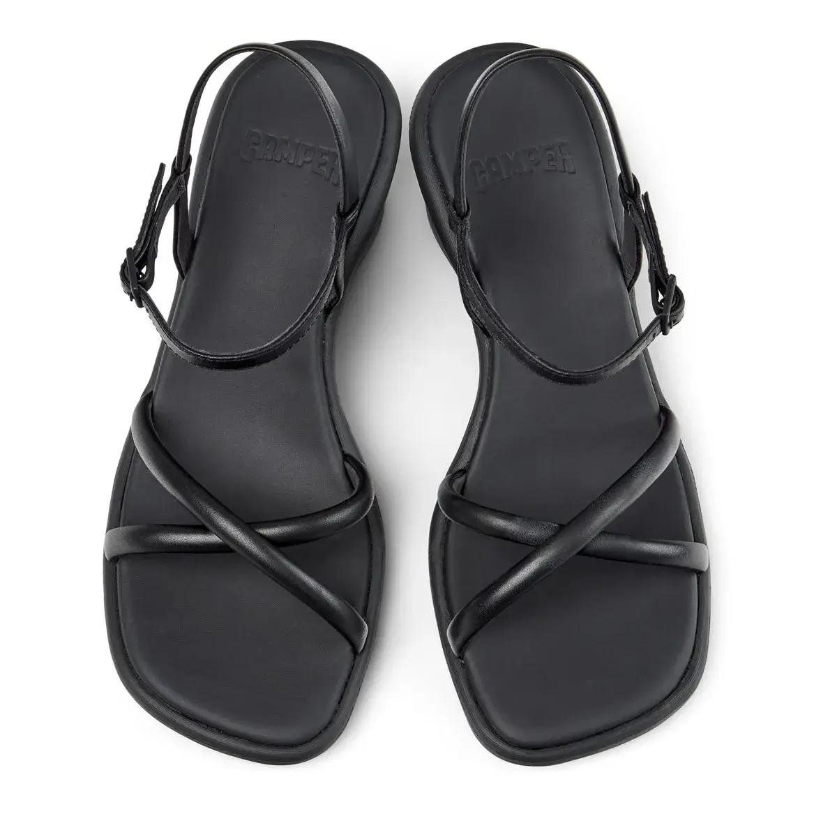 Minimalistische schwarze Leder Keilsandalen