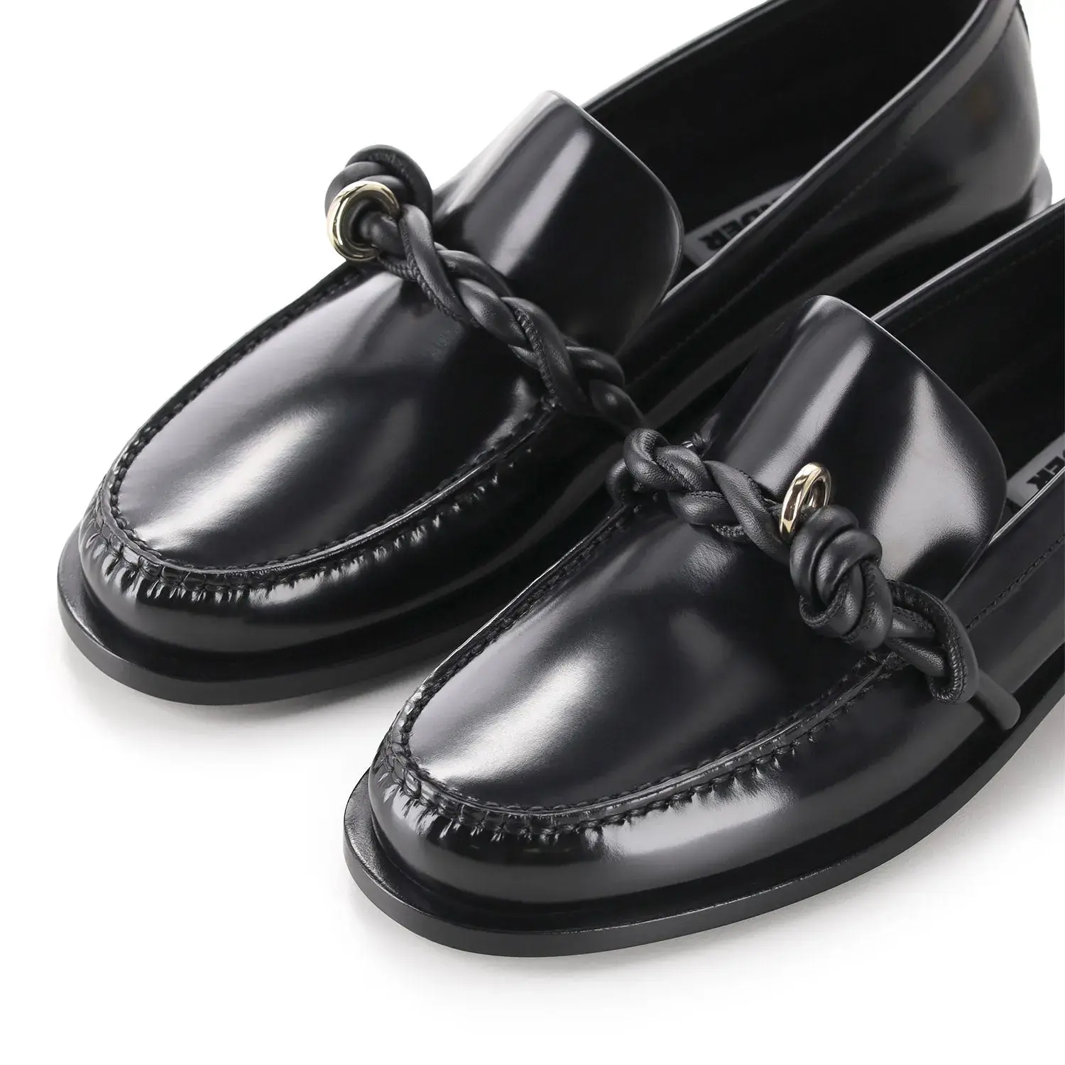 Geflochtene Lederloafer mit goldenem Detail