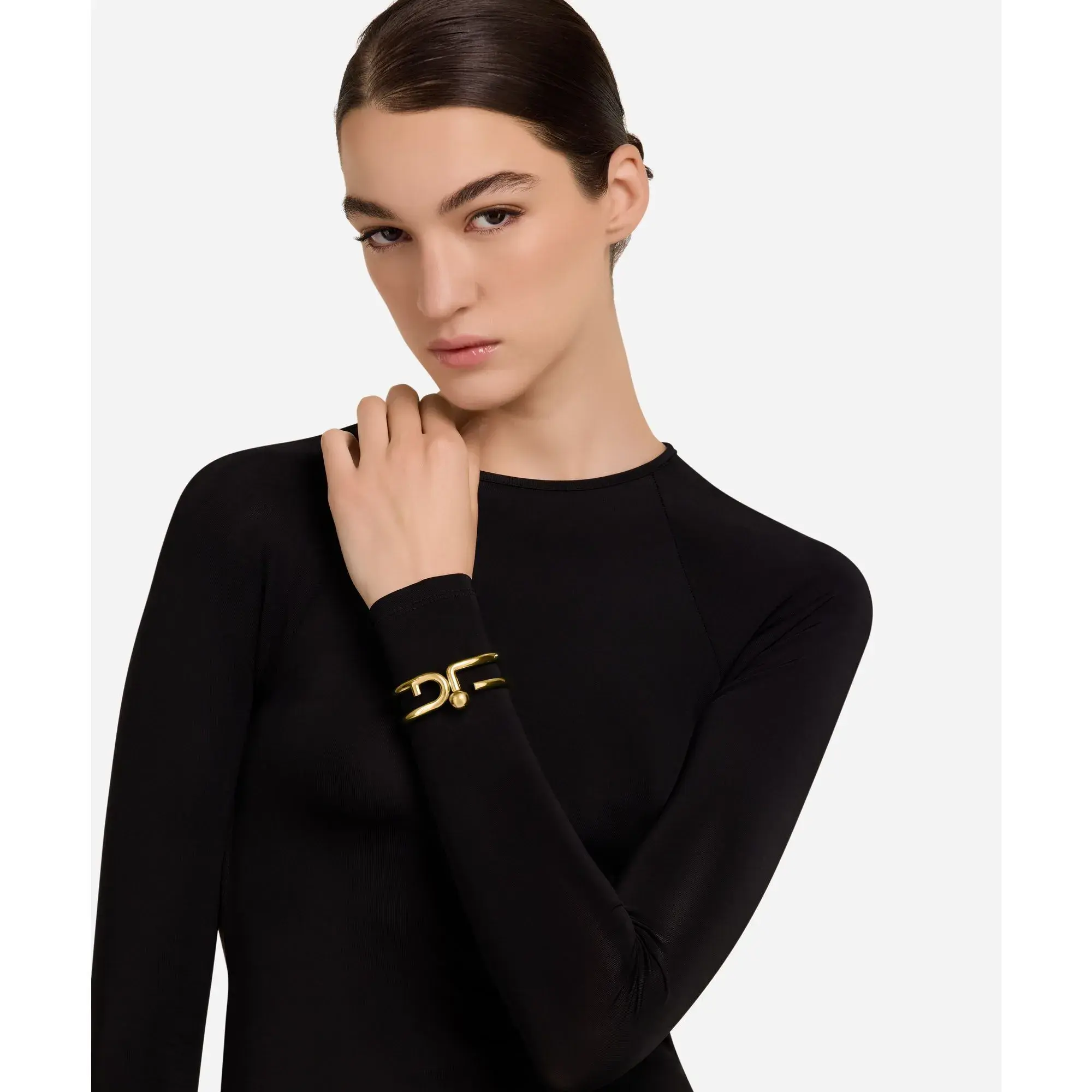 Minimalistisches, goldfarbenes Logo Armreif