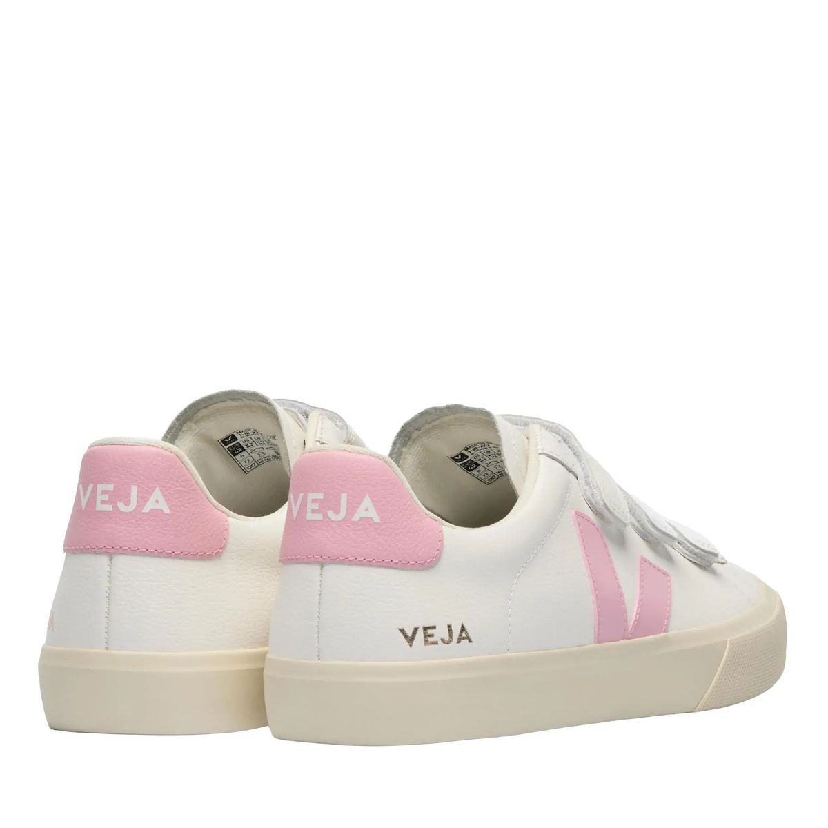 Weiße Sneaker mit pinkfarbenen Akzenten
