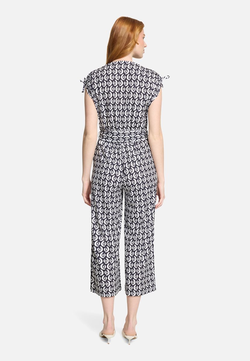 Gemusterter Jumpsuit mit weitem Bein