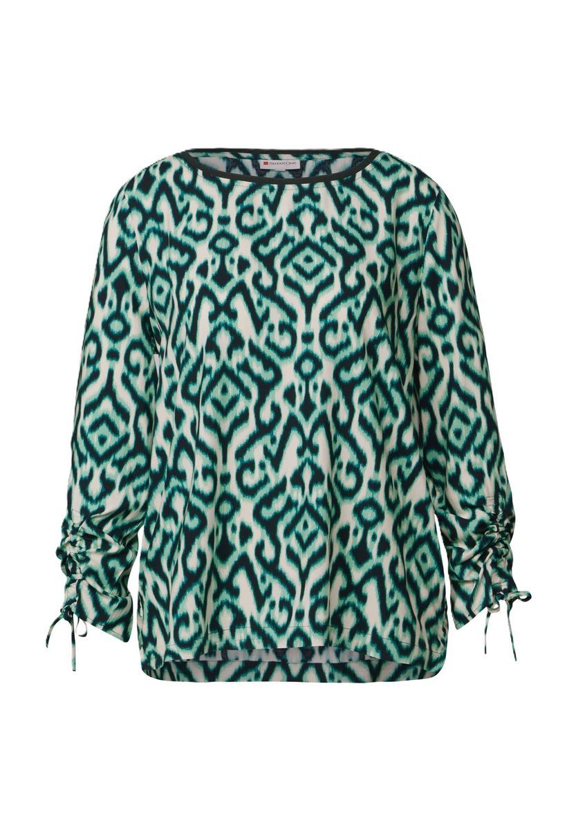 Grüne und beige gemusterte Bluse
