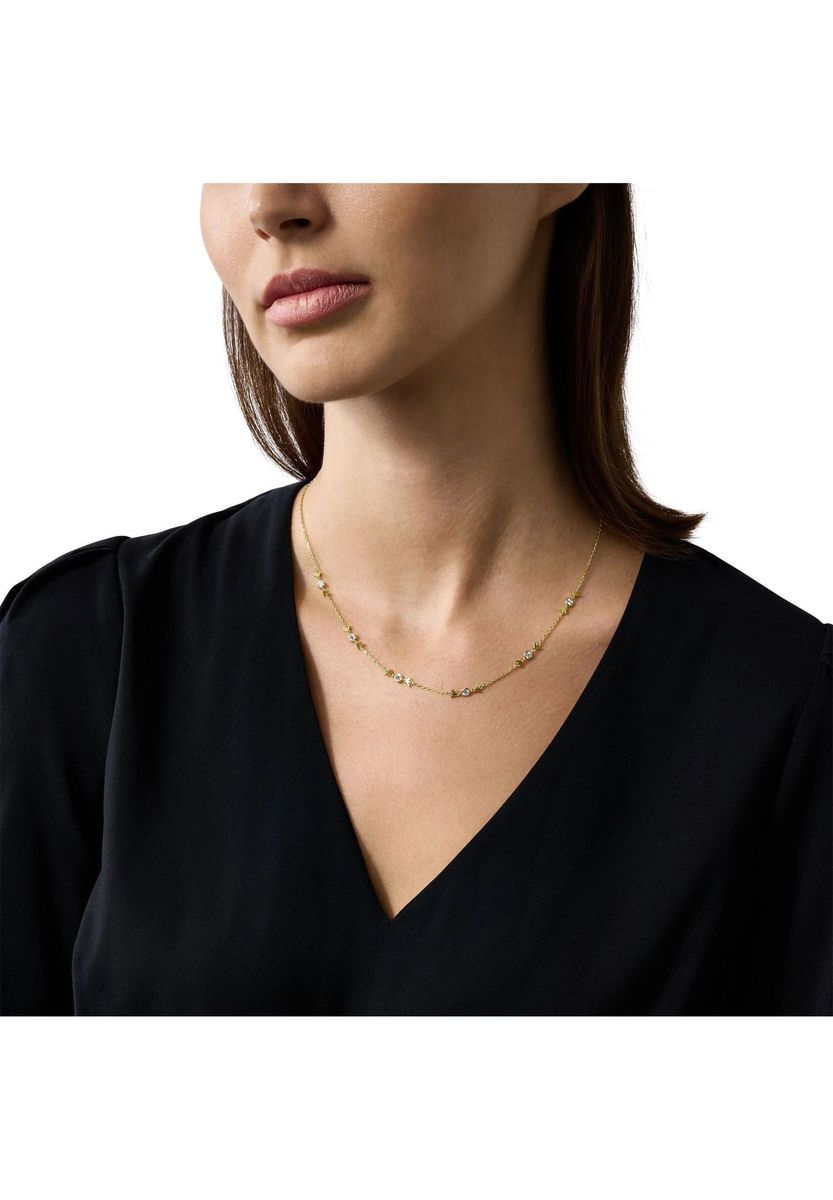 Zarte goldfarbene Halskette mit Anhängern