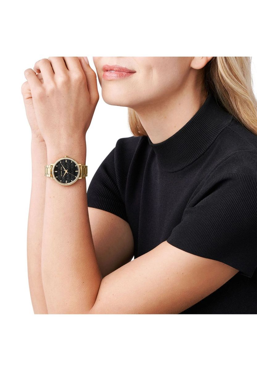 Elegante goldene Armbanduhr mit Kristallakzenten