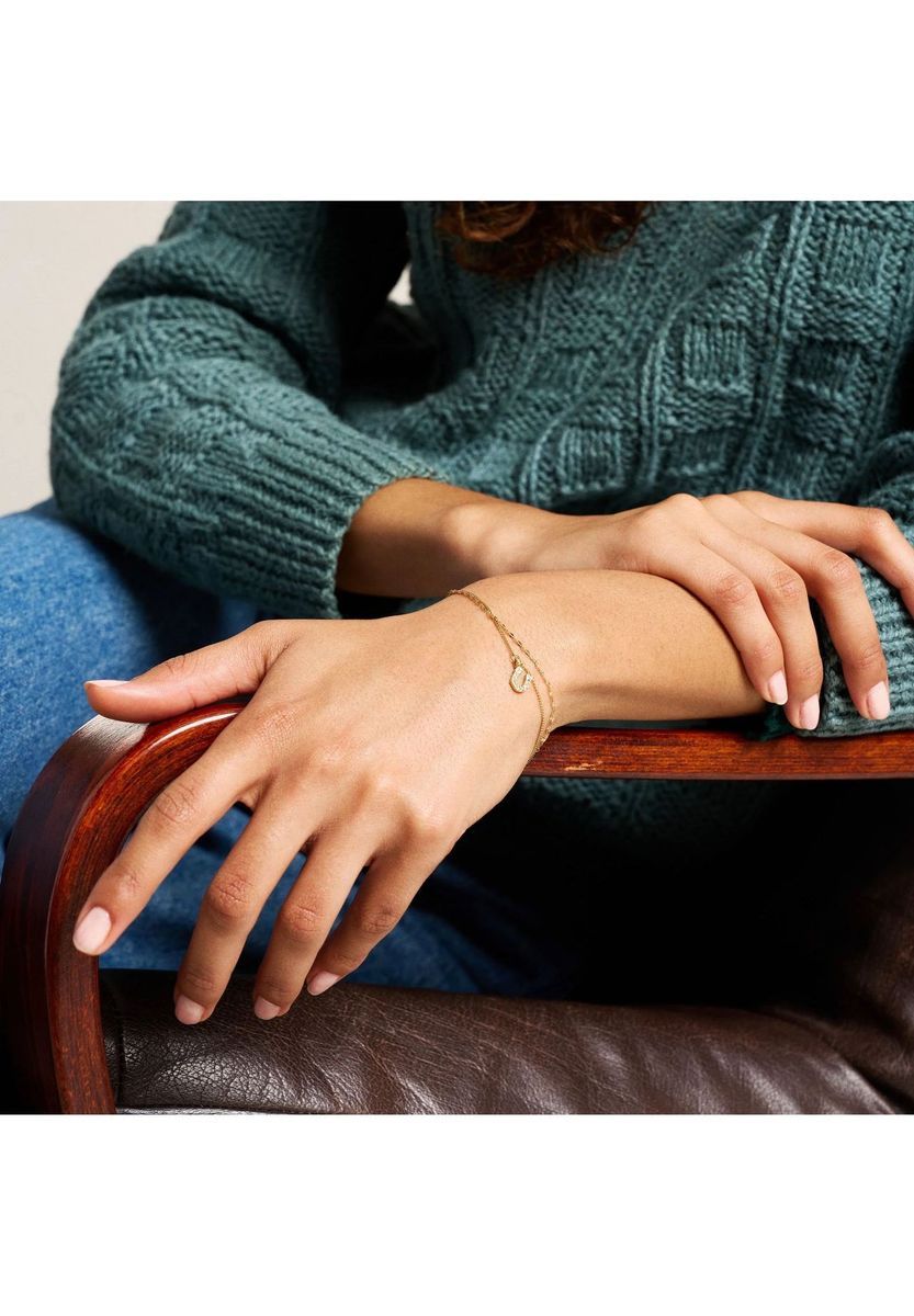 Zartes goldfarbenes Armband mit Hufeisenanhänger