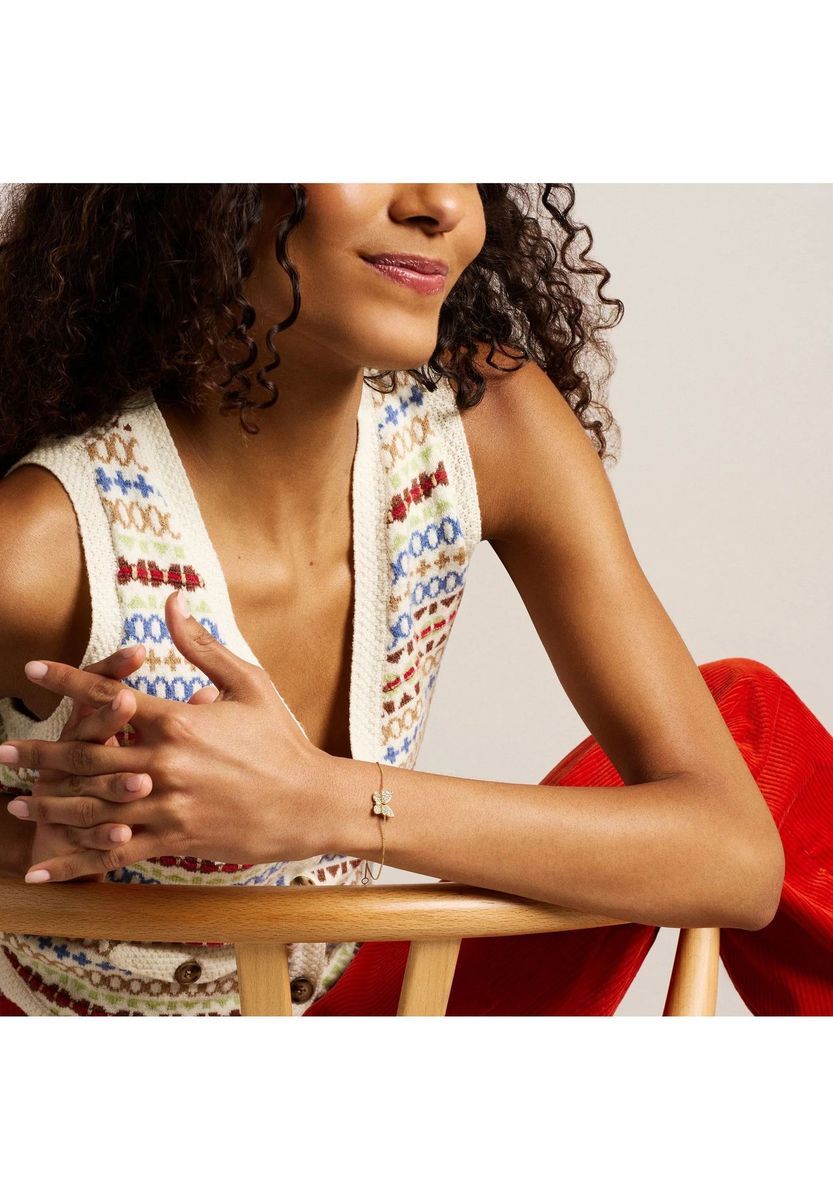 Goldenes Schmetterlingsarmband mit Kristallen