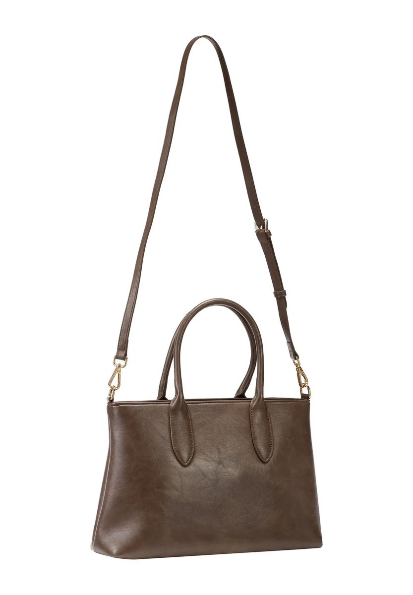 Zeitlose Handtasche mit dekorativen Anhängern