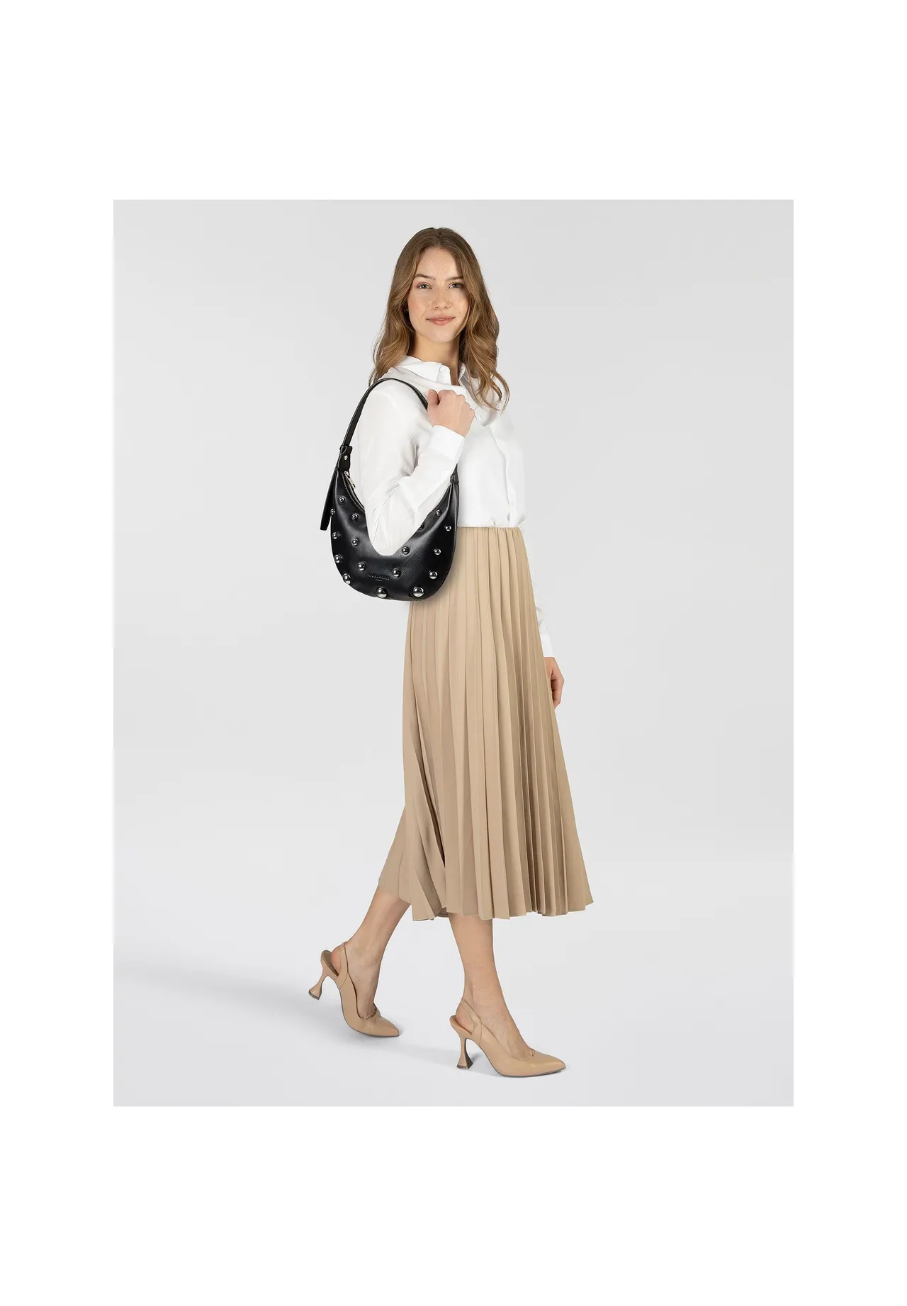 Besetzte Leder-Halbmond-Schultertache