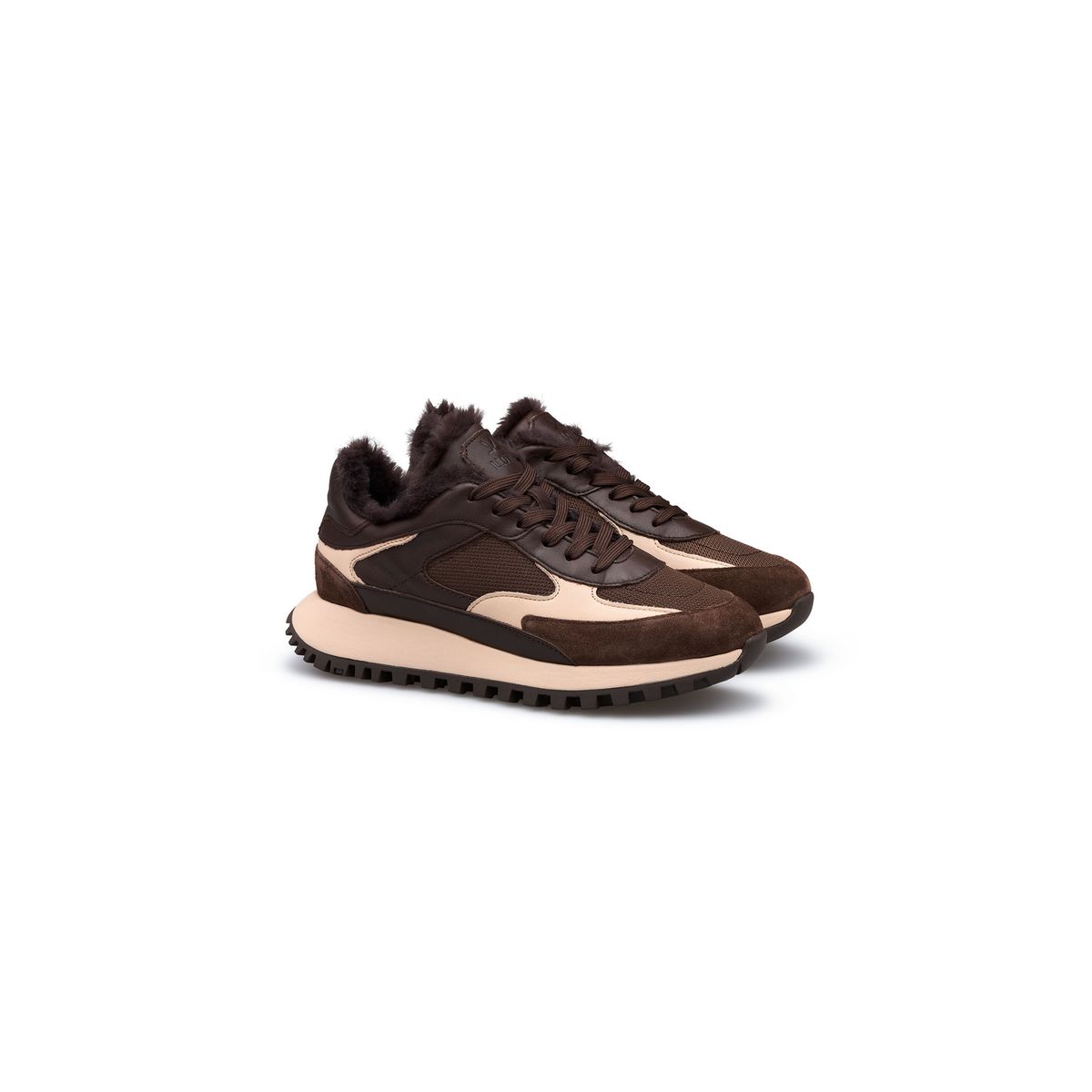 Sneaker mit Plateausohle und Fellbesatz
