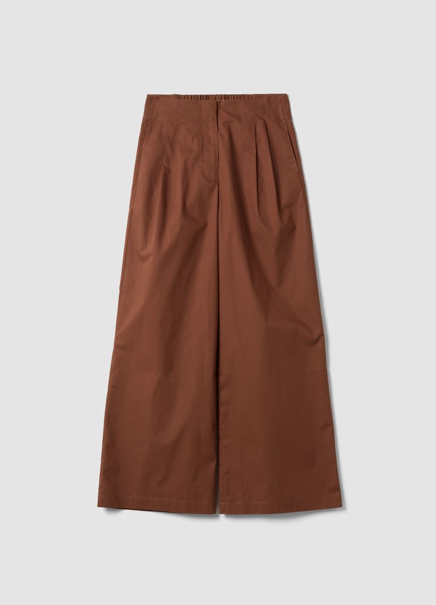 Hochgeschnittene Bundfaltenhose mit weitem Bein