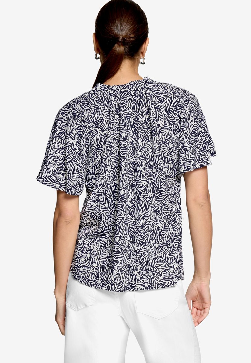 Bluse mit Blattmuster und V-Ausschnitt