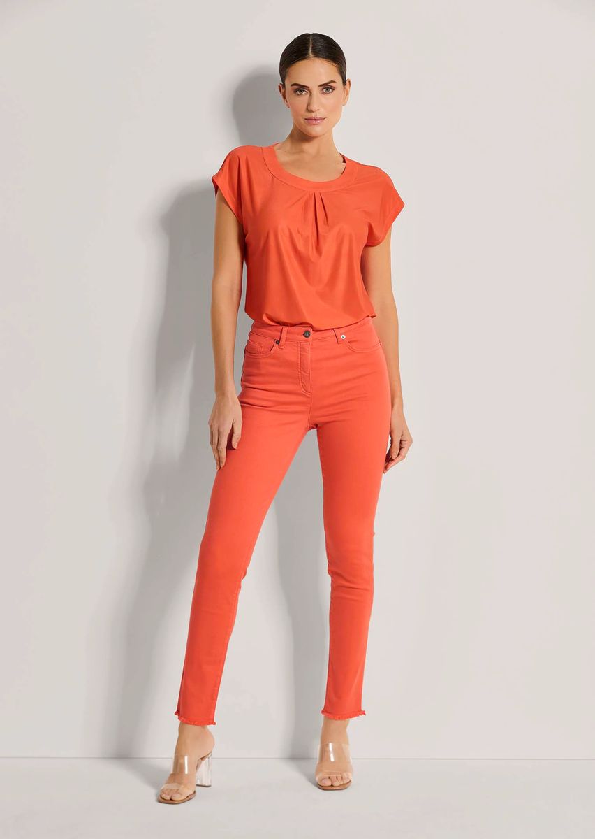 Skinny-Jeans mit feinem Fransensaum