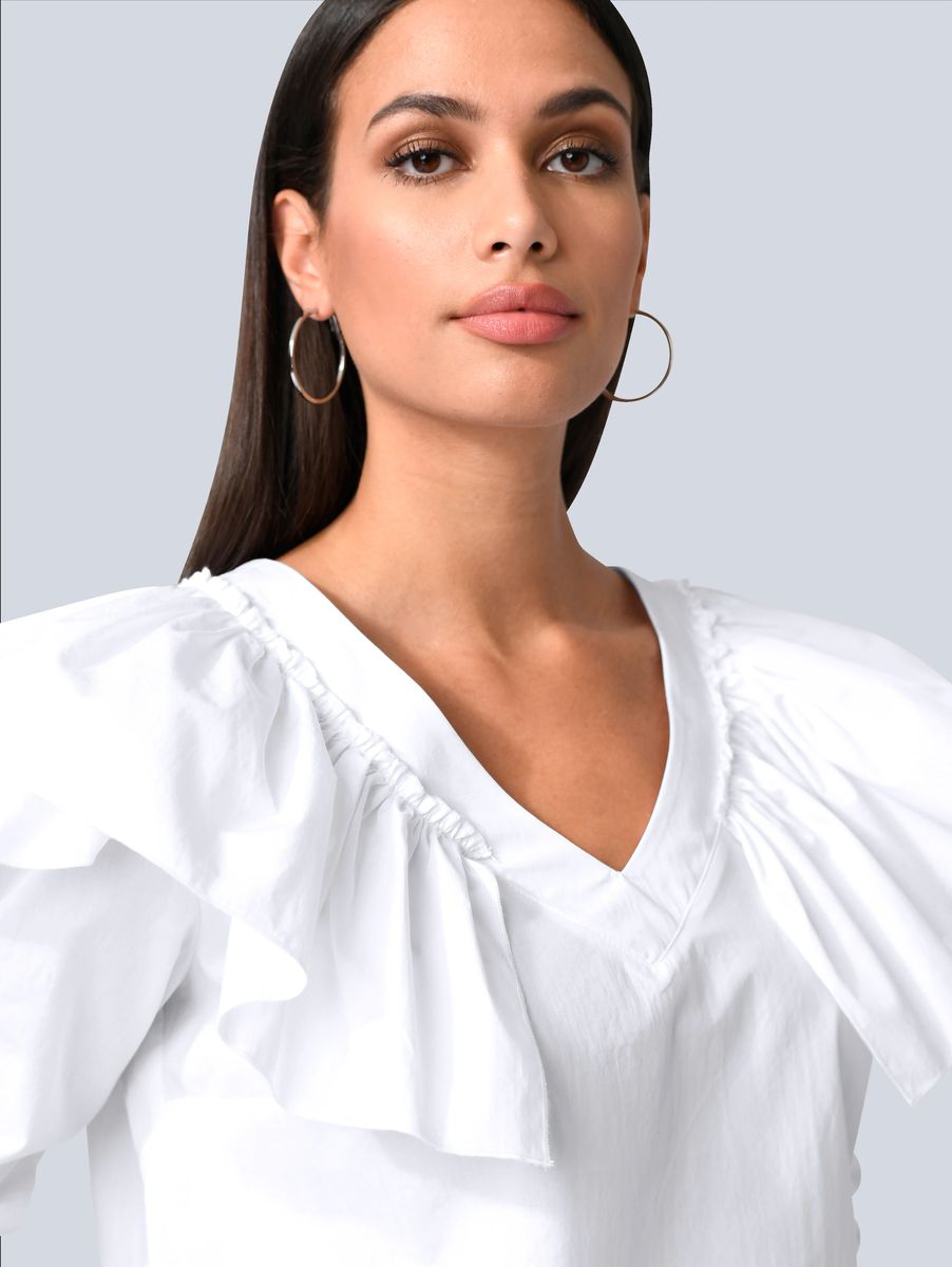 V-Ausschnitt Bluse mit opulenten Rüschen