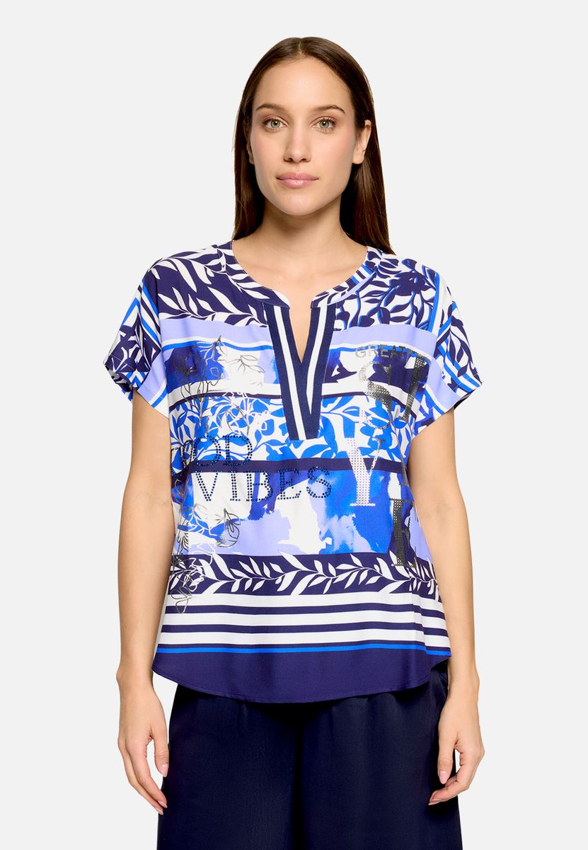 Florale Tunika-Bluse mit Glitzersteinen