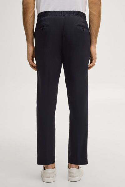 Dunkelblaue, verkürzte Stoffhose mit Bundfalten