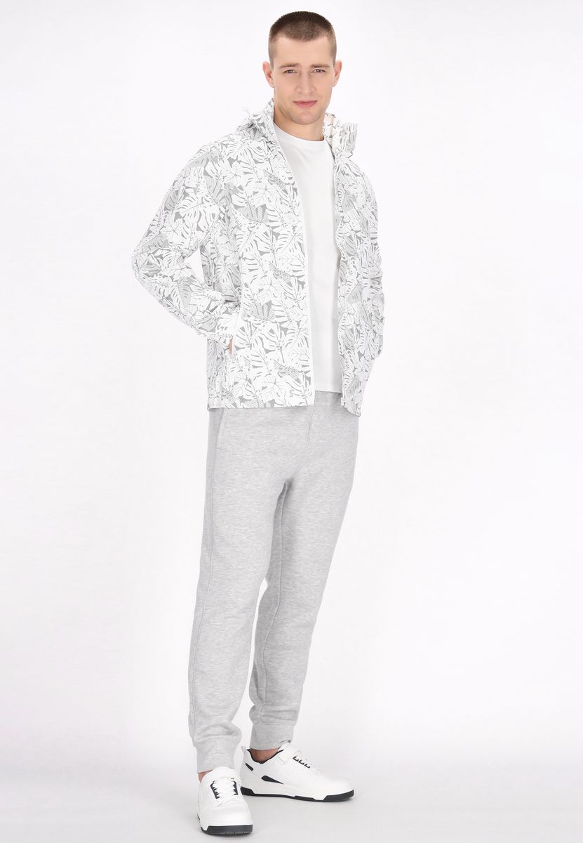 Windjacke mit botanischem Allover-Print