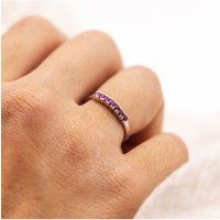 Weißgoldring mit sieben Rubinen