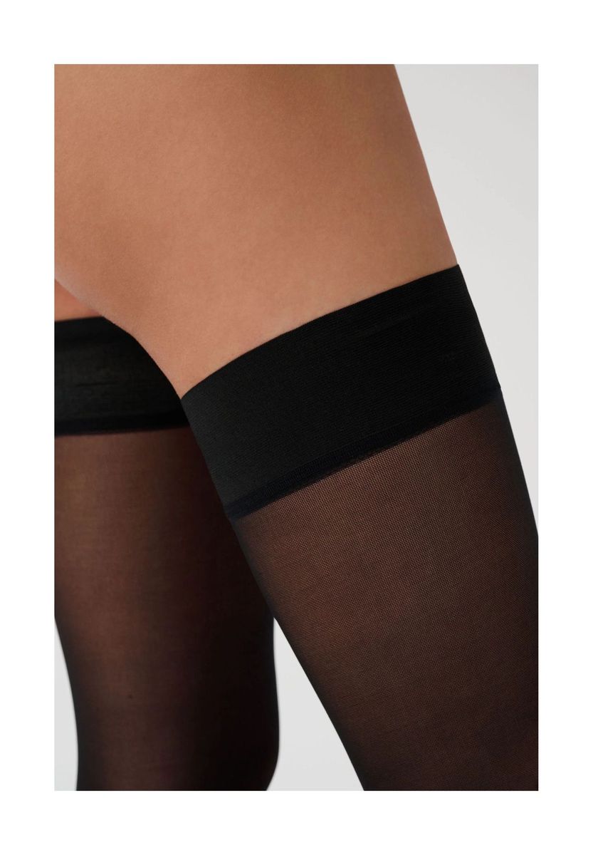 Elegante, transparente, schwarze Stay-Up-Strümpfe